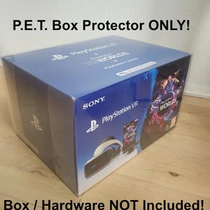 May include: A blue and white PlayStation VR Worlds box protector. The box protector is made of clear plastic and is designed to protect the original box from damage. The text "P.E.T. Box Protector ONLY!" is printed on the front of the box protector. The text "Box / Hardware NOT Included!" is printed on the bottom of the box protector.