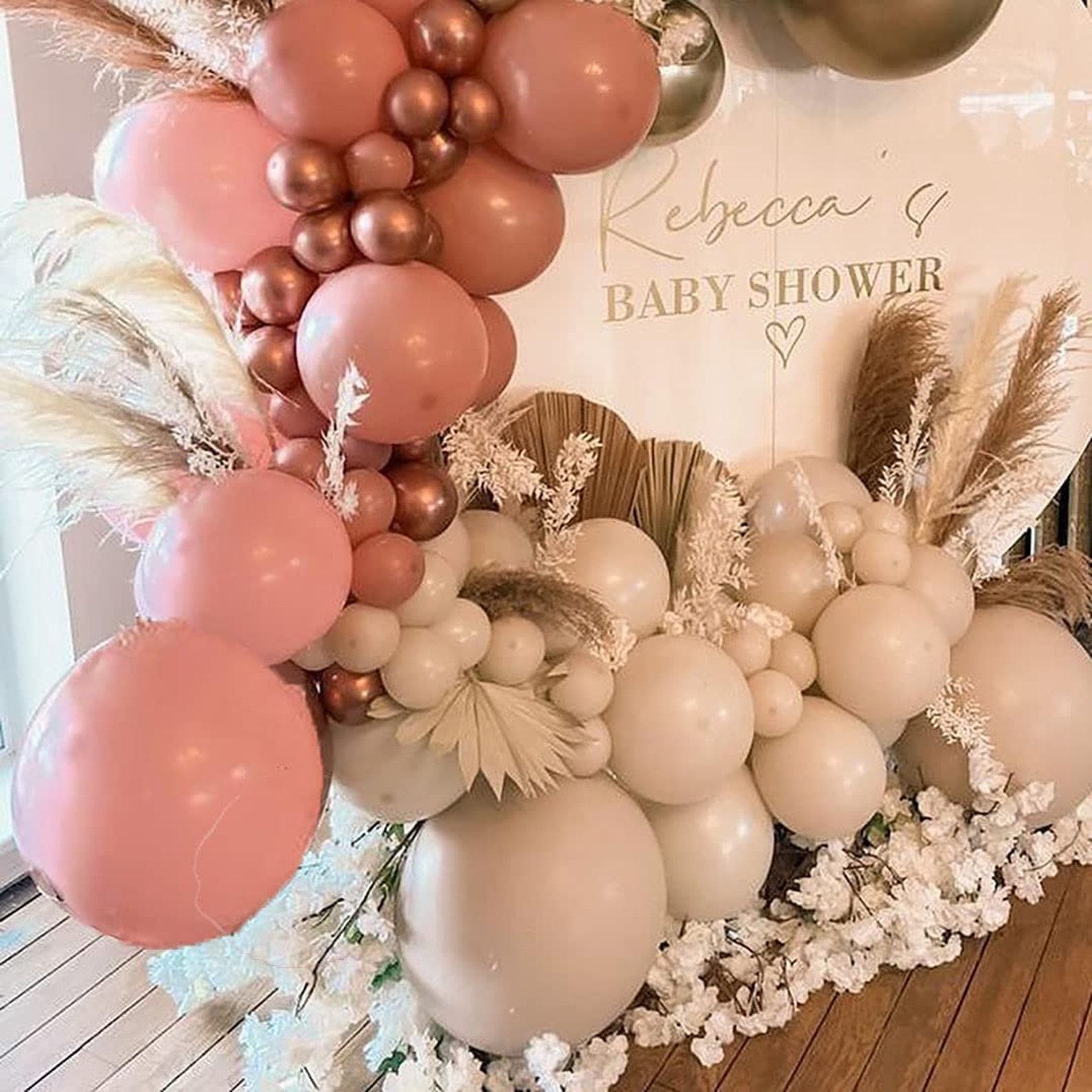 pink and grey balloon arch