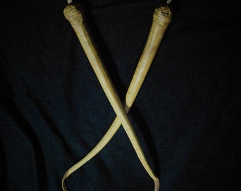 Látigo de serpiente con columpio doble