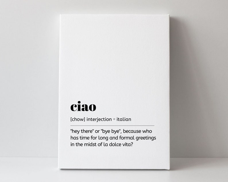 May include: A white canvas print with black text that reads "ciao" and defines the word as an Italian interjection meaning "hey there" or "bye bye".