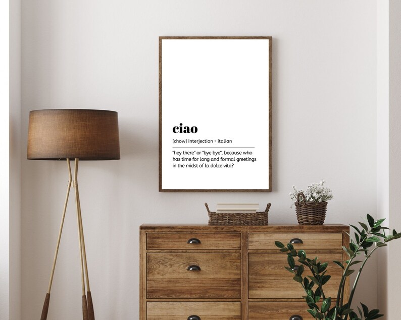 May include: Black and white printable wall art with the definition of the Italian word "ciao" which means "hey there" or "bye bye".