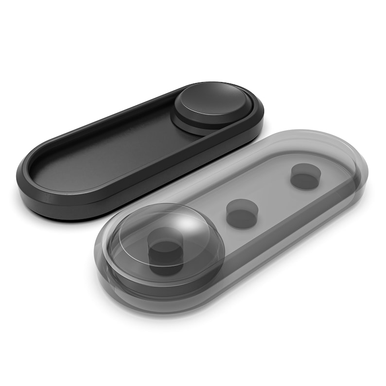 Puede incluir: Dos juguetes fidget oblongos con forma de bot&oacute;n. Uno es negro s&oacute;lido, el otro gris transl&uacute;cido. Cada uno tiene un bot&oacute;n grande en relieve y botones m&aacute;s peque&ntilde;os empotrados. Estos juguetes est&aacute;n dise&ntilde;ados para la estimulaci&oacute;n t&aacute;ctil y el alivio del estr&eacute;s.