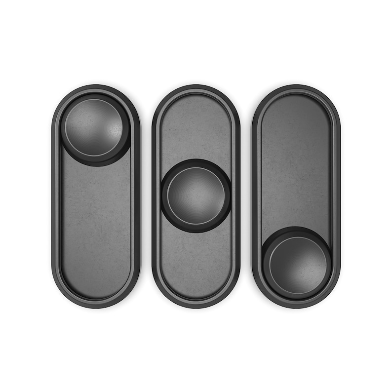Puede incluir: Tres interruptores deslizantes de forma oblonga de color gris oscuro con extremos redondeados. Cada interruptor tiene un bot&oacute;n circular que se puede mover hacia arriba o hacia abajo. Los interruptores est&aacute;n sobre un fondo blanco.