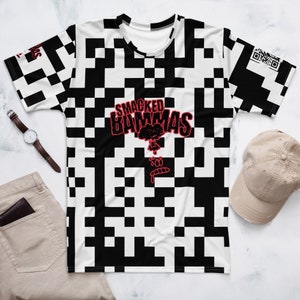 May include: A white t-shirt with a black and white pixelated pattern. The shirt has a red graphic with the text "SMACKED BAMMAS" and a cartoon cloud with a face.