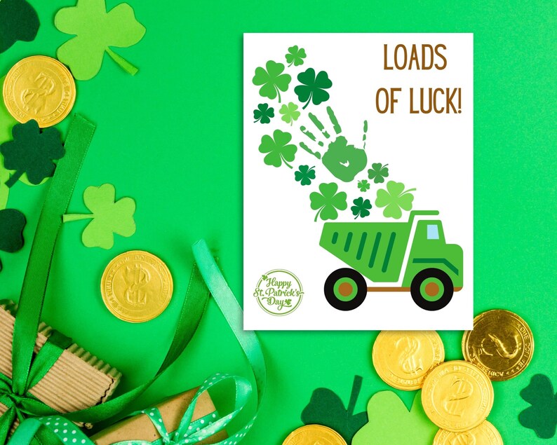 May include: A green dump truck with a handprint and shamrocks pouring out of the back. The truck is on a white card with the text "Loads of Luck!" and "Happy St. Patrick's Day".