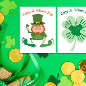 May include: Two printable cards for a St. Patrick's Day craft. One card features a cartoon leprechaun with green clothing and a hat, and the other card features a green shamrock. Both cards have the text "Happy St. Patrick's Day".