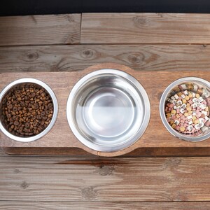 triple stand for cats with one middle larger bowl for water