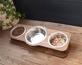 Tilted Cat & Small Dog Food Bowl Stand, Raised Feeding Station with 3 Bowls Cat Feeder, Elevated Triple Bowls 370ml/12.5oz and 800ml/27oz product logo
