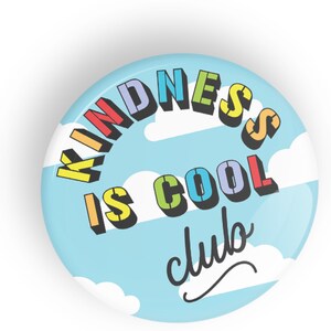 May include: A blue button with white clouds and the text "Kindness is Cool Club" in rainbow colors.