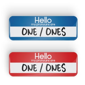 May include: Two name tags, one blue and one red, with the text "Hello my pronouns are ONE / ONES" on each.