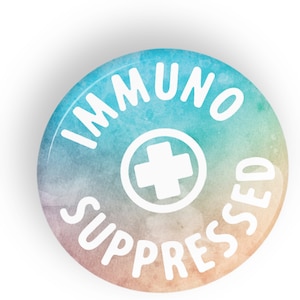 May include: A circular badge featuring the words "IMMUNO SUPPRESSED" in white, encircling a white cross symbol. The background has a watercolour effect with blue, green, and peach hues.
