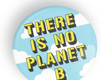 May include: A round blue button with white clouds and yellow text that reads "THERE IS NO PLANET B".