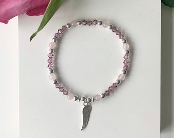 Pulsera de amatista y cuarzo rosa con alas de ángel de plata de ley