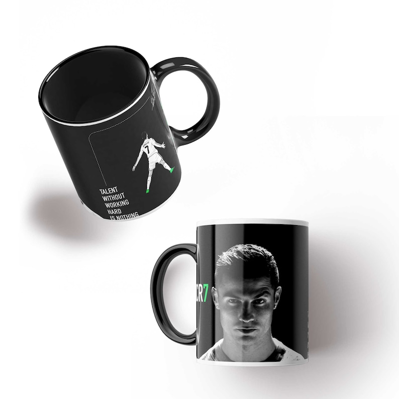 May include: Black ceramic mug with a white interior. The mug features a black and white image of Cristiano Ronaldo with the text "CR7" in green. The other side of the mug features a black and white image of Ronaldo playing football with the text "Talent without working hard is nothing".