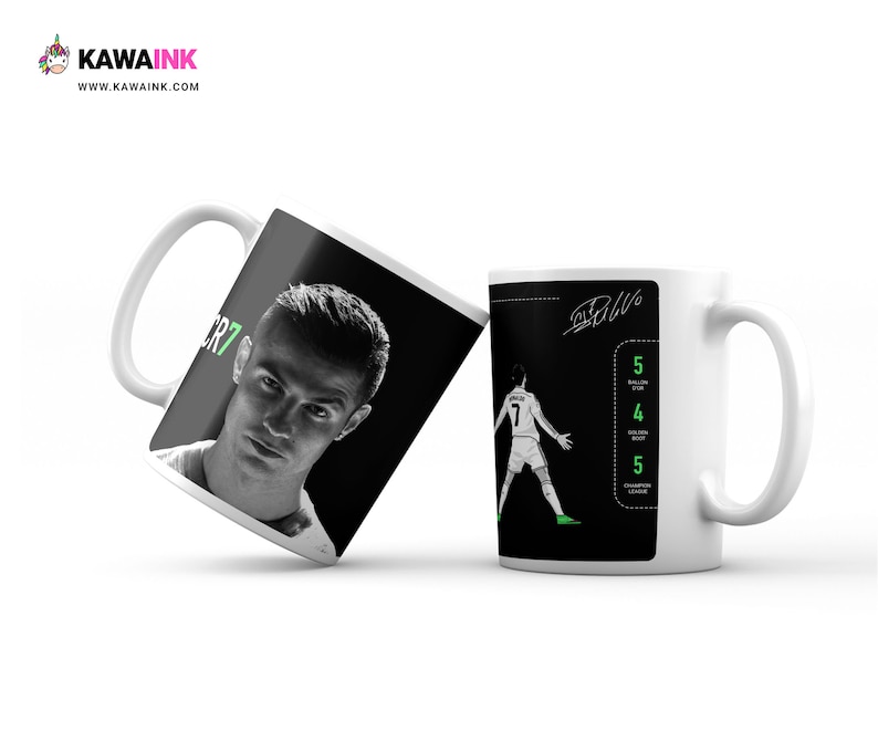 May include: Two white ceramic mugs with black and white images of a football player. One mug features a close-up of Cristiano Ronaldo with the text "CR7". The other mug features a player in action with the text "Ballon d'Or" and a list of awards won.
