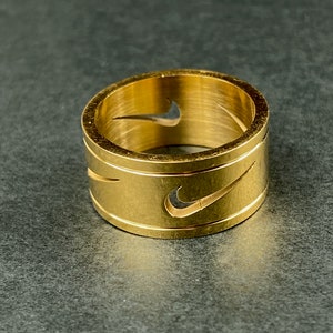 nike tick ring