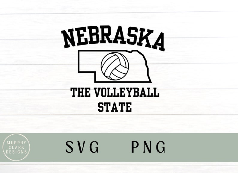 May include: Black and white graphic design featuring the outline of the state of Nebraska with a volleyball inside. The text "Nebraska" is above the state outline and the text "The Volleyball State" is below.