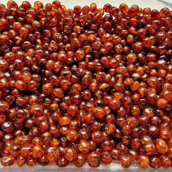 Perles d'ambre de la Baltique naturel Cognoc/pas clair 5-6 mm 100 pcs