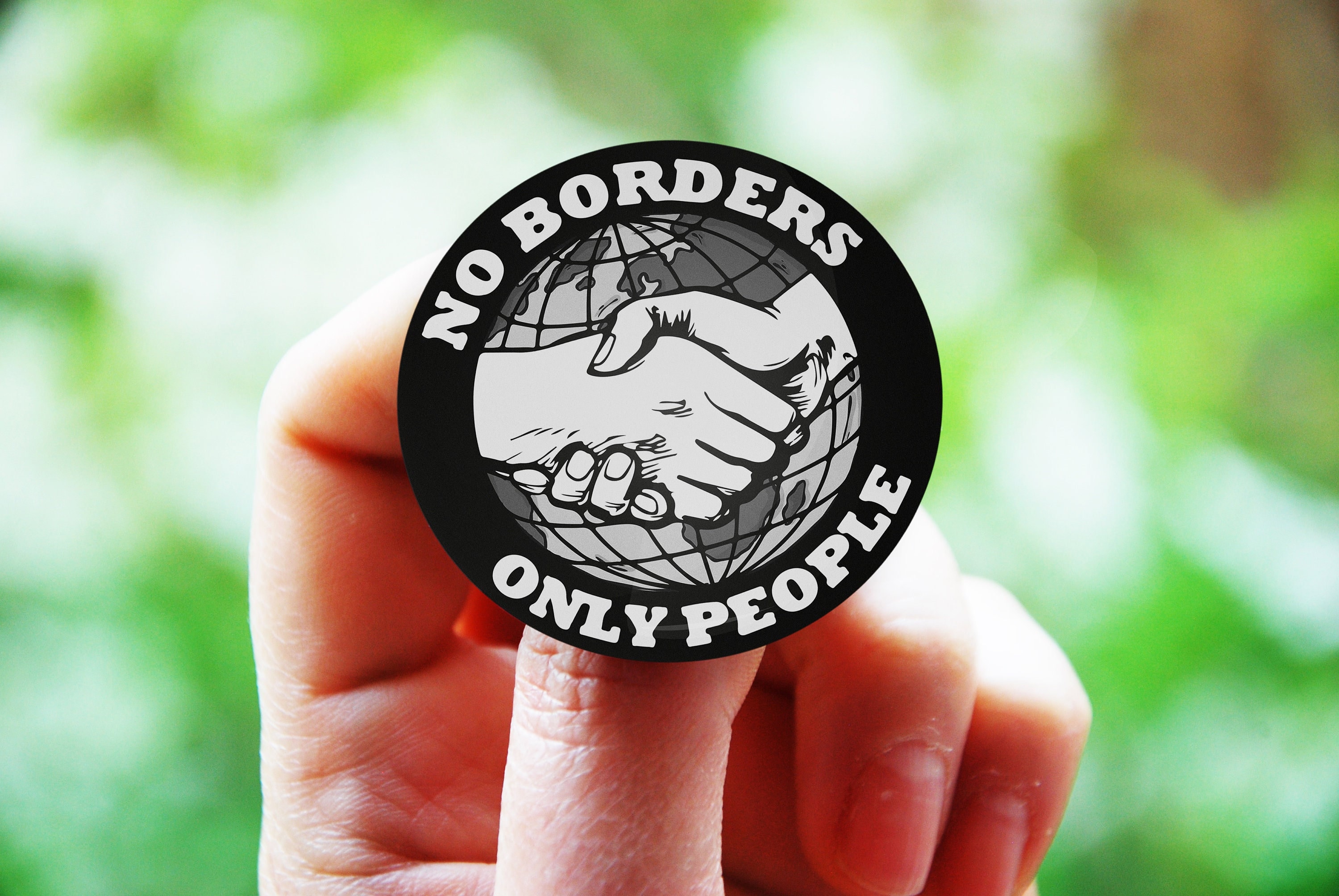 No Borders Only People badges, NO WAR, No one is illegal, Refugees welcome, no human is illegal, No nations No borders, No Gods, No Masters