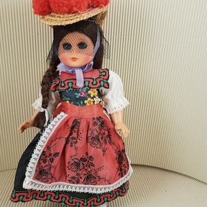 Vintage mini folklore ethnic plastic doll collectible south