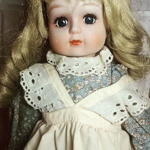 Vintage old bisque porcelain doll collectible medium size blond haired