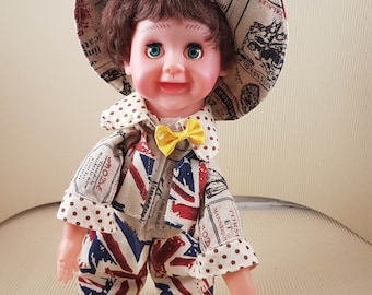 vintage plastic boy doll dancing and singing