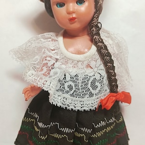 Vintage mini folklore ethnic plastic doll collectible