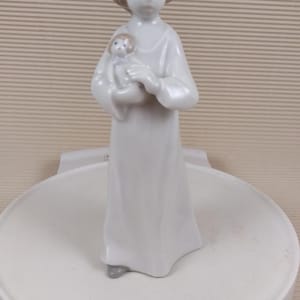 Vintage porcelain figurine girl with doll Germany