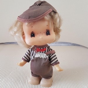 Small vintage old plastic doll