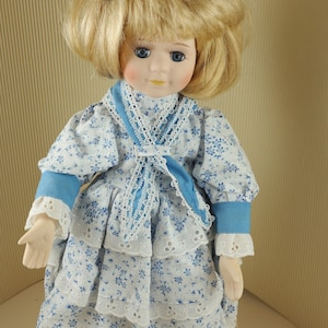 Vintage old bisque porcelain doll collectible medium size Anne from green blond haired haired