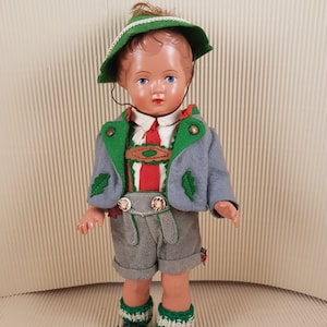 Vintage antique mini folklore ethnic plastic doll collectible