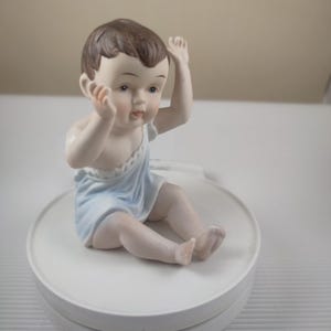 Vintage little baby boy porcelain figurine
