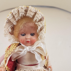 Vintage mini folklore ethnic plastic doll collectible