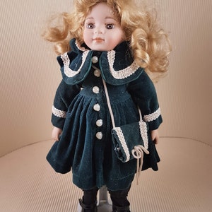 Vintage bisque porcelain doll collectible medium size blond hair victorian dressed wirhbag