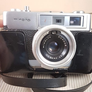 Vintage Minolta AL - F camera, lens Minolta rokkor 38 mm