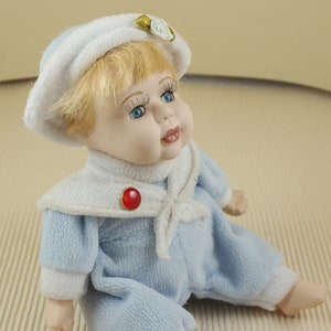 Vintage old bisque porcelain doll collectible music box