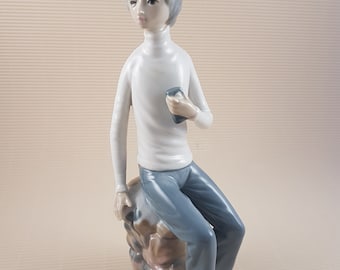 Vintage boy with phone figurine casade spain porcelain