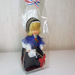 Vintage mini folklore ethnic plastic doll collectible