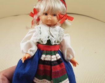 Vintage mini folklore ethnic plastic doll collectible