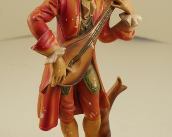 Vintage victorian boy playing music italy depose figurine hard resin