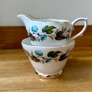 ROYAL SUTHERLAND Vintage l Milk Jug / Creamer & Sugar Bowl l ‘Blue flowers and green leaves l Bone China