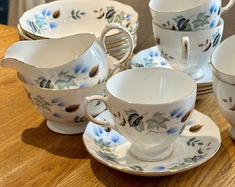 VINTAGE COLCOUGH LINDEN Blue/Brown Teacups, Saucers, Milk Jug, Sugar Bowl, Dessert/Cereal Bowls, Plates, Bone China England 1970s