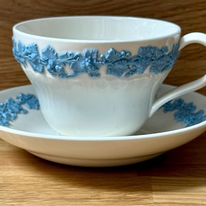 WEDGWOOD & BARLASTON of ETRURIA Queensware Cup and Saucer l White with blue motif I Made in England l Embossed Blue on White Pattern