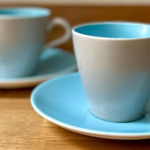 POOLE POTTERY TWINTONE pair of vintage Poole Pottery &#39;Twintone&#39; sky blue & dove grey C104 narrow contour tea cups and saucers duos.