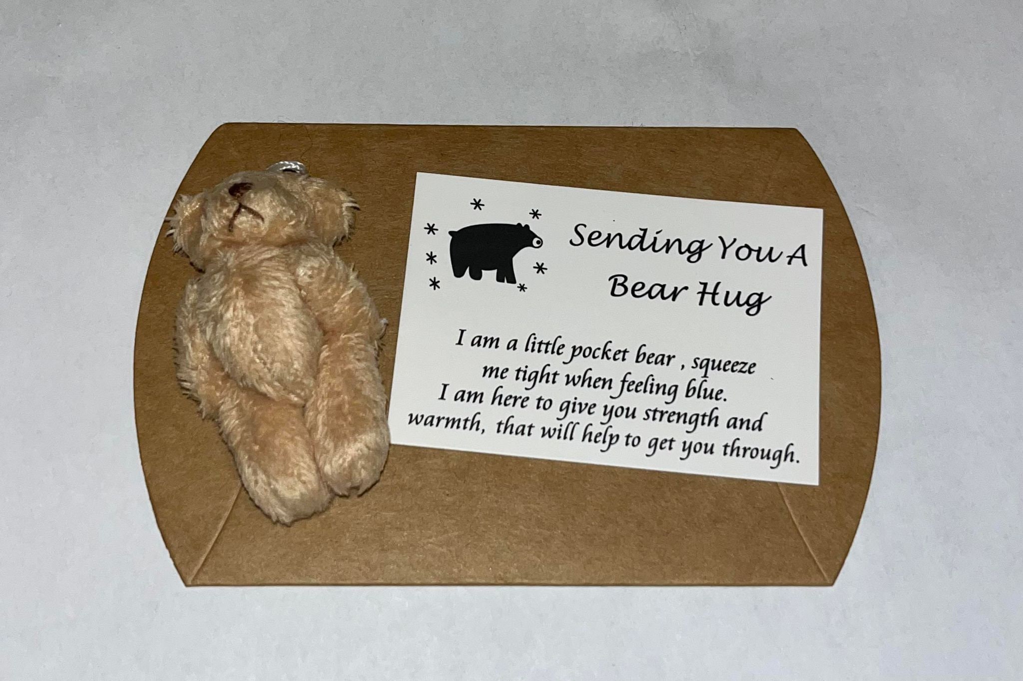 Hugging teddy bear online deals