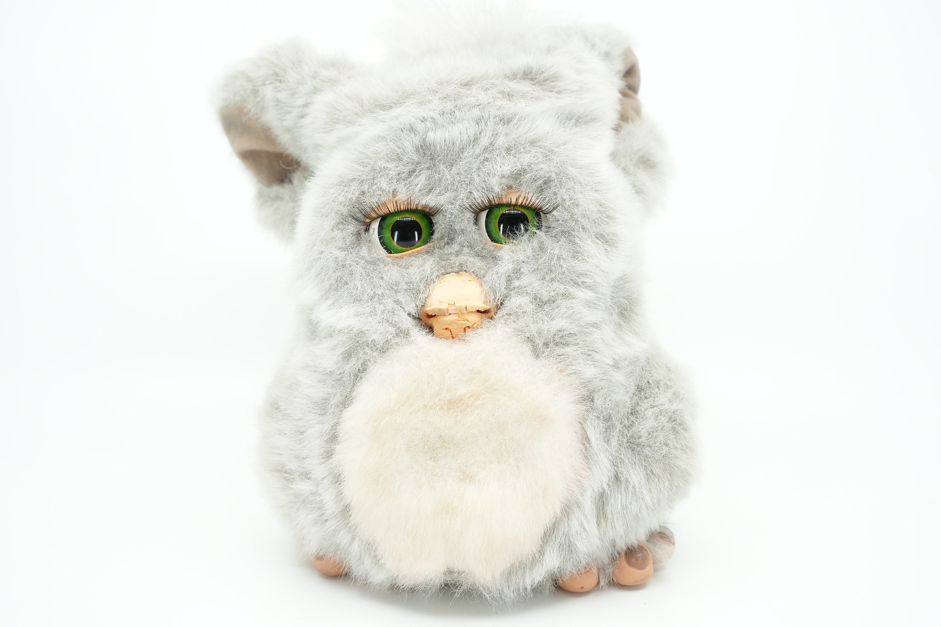 Grey and cheap white furby