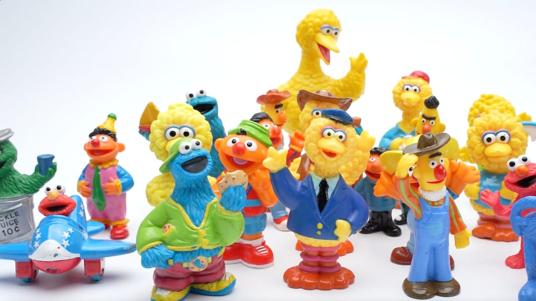 Sesame Street Figures From Different Years and Sizes sesame Street