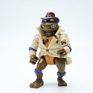 Donatello (Undercover) Action Figure – Vintage Teenage Mutant Ninja Turtles Disguise Series (1990s)