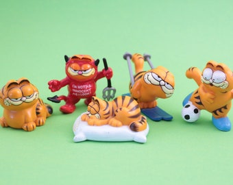 Garfield PVC figuren | Garfield vintage figuren uit de jaren 1980 / 1990 (kussen, duivel, skiën, voetballen, zitten)