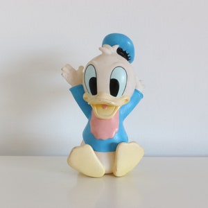 Vintage Donald Duck squeaky toy, Disney 1980s rubber figure, collectible character, retro kids room decor, classic baby toy